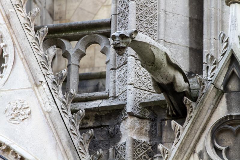 Another gargoyle perched at the top of Notre Dame in Paris