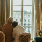 Couple sitting down looking out the window