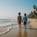 Brothers holding hands together by the beach