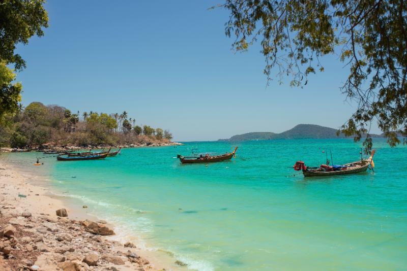 Local boats at Koh Tonsay beach in Cambodia