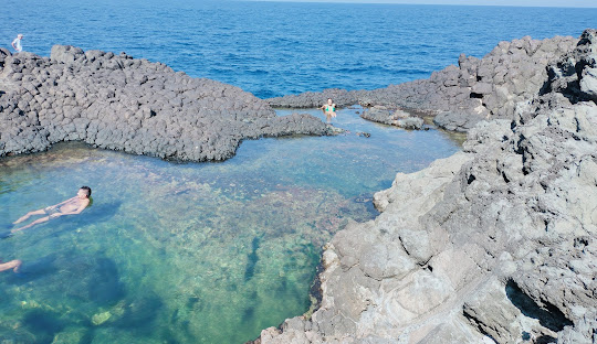 Beachgoers at Pantelleria, Italy