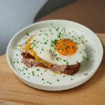 Plate with Croque Madame Sandwich