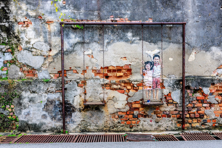 Street Art - Brother & Sister on a Swing
