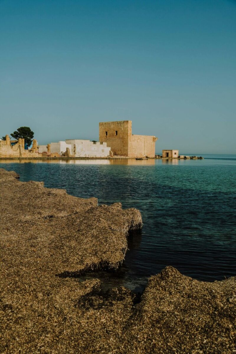 Scenic view of the coastal waters and ancient structures in Trapani