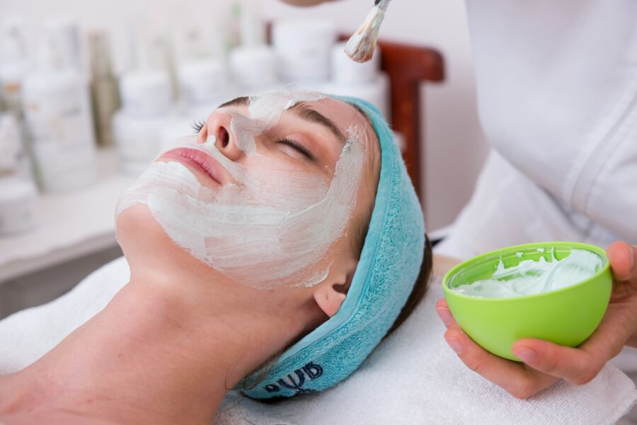 Woman having facial