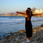Woman in black enjoying the scenery in Naxos, Greece