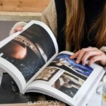 Woman reading magazine