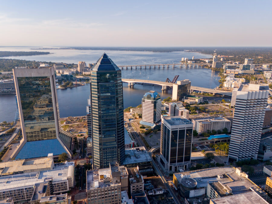 Aerial view of Downtown Jacksonville, Florida, showcasing skyscrapers and the St. Johns River