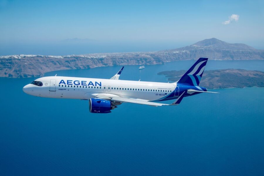 Aegean Airlines aircraft over Aegean Sea, highlighting Greeces picturesque islands and Mediterranean allure.