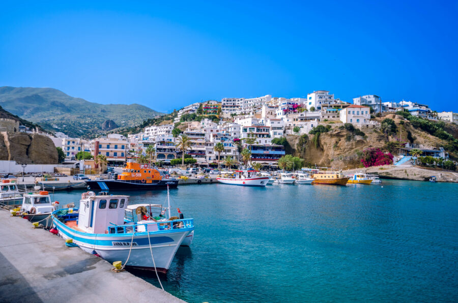Agia Galini, a charming seaside resort in Crete, offers stunning views of the Libyan Sea and amenities