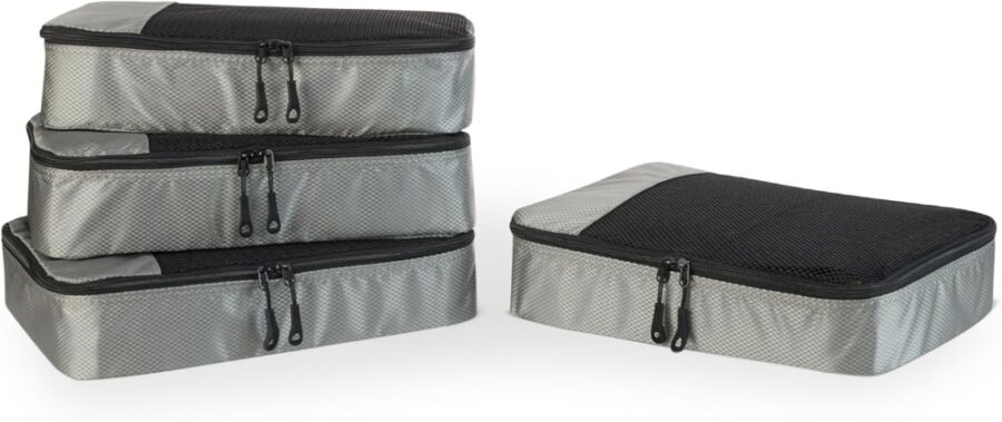 Four black and gray Amazon Basics travel bags with handles, designed for organized packing and travel convenience.