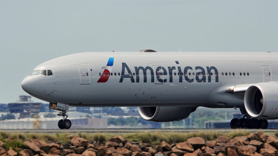 American Airlines Boeing plane on the runway at Sydney Airport, amid news of flight cuts to Chicago and New York.