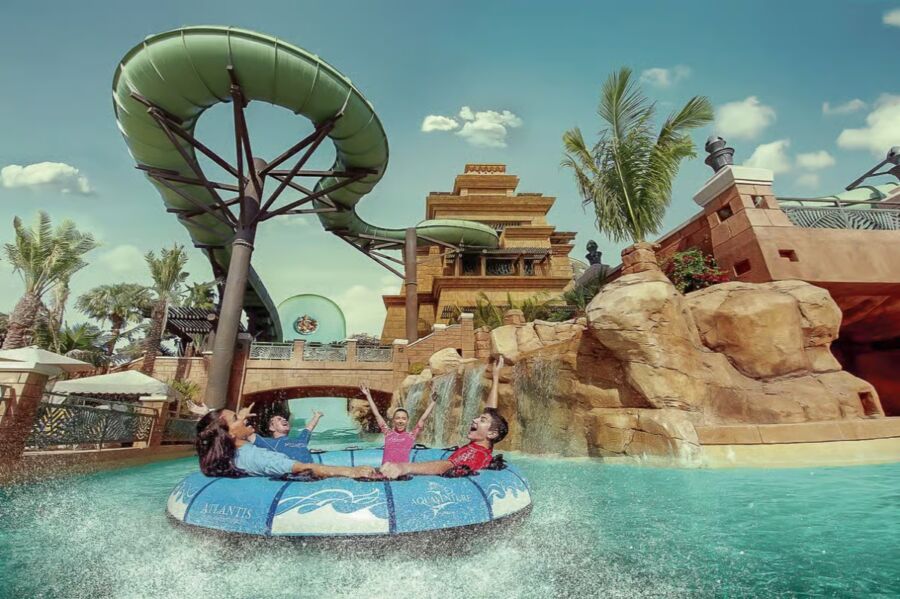 Atlantis Aquaventure Water Park, showcasing exciting water rides and lush surroundings in Dubai.

