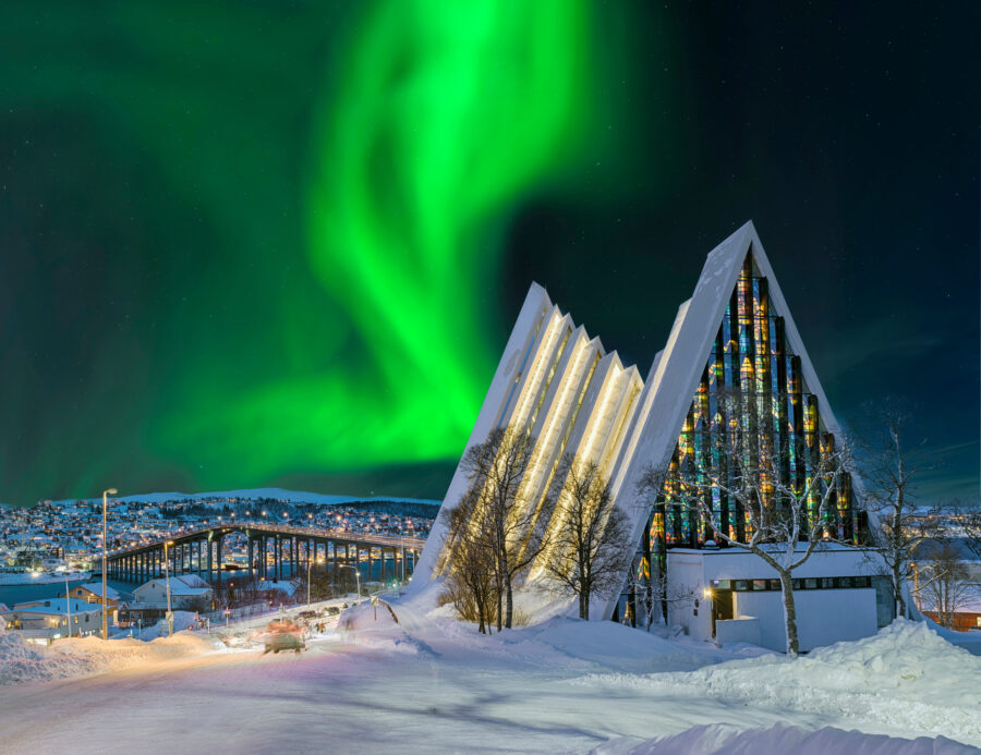 Arctic Cathedral, a striking parish church in Tromsø, Norway, features a unique triangular design and stunning stained glass.