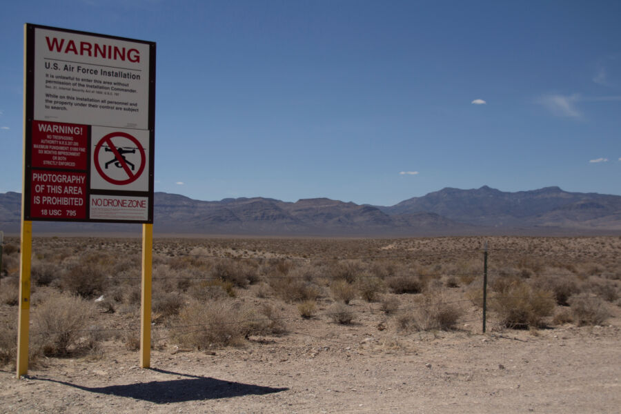 Warning sign for Area 51 under a blue sky in Southern Nevada