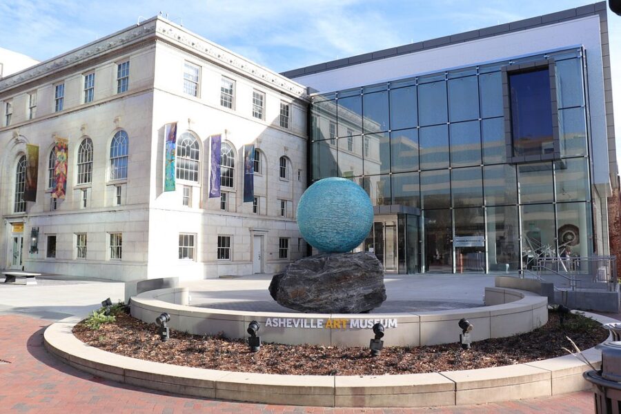 Big blue fountain in front of the Asheville Art Museum, creating a whimsical scene near the entrance.