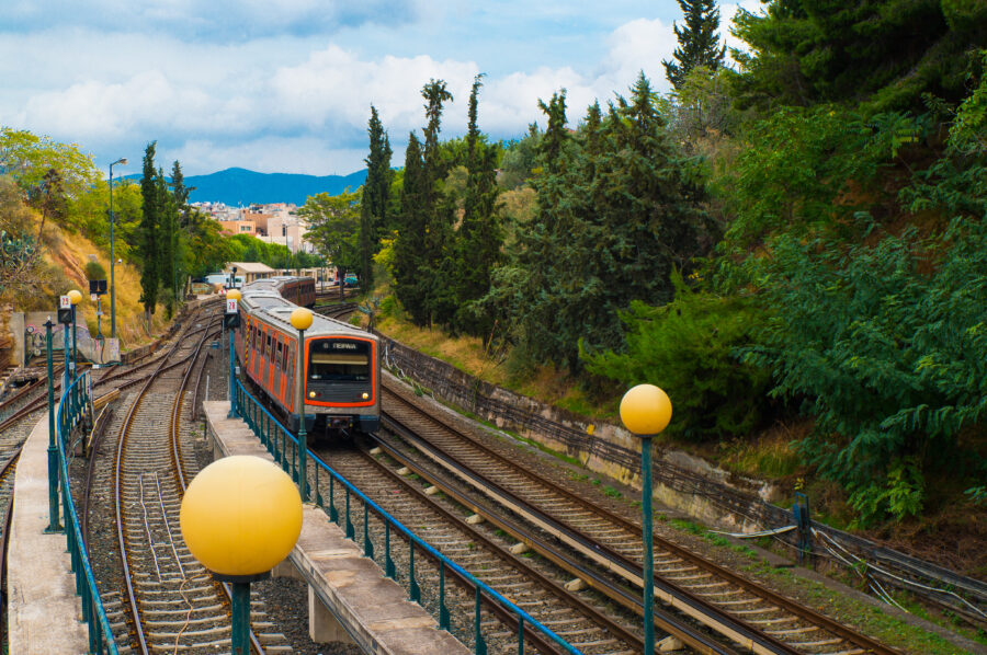 Electric train at Thiseio station, part of Athens' historic urban rapid transit system, showcasing Greek transportation heritage