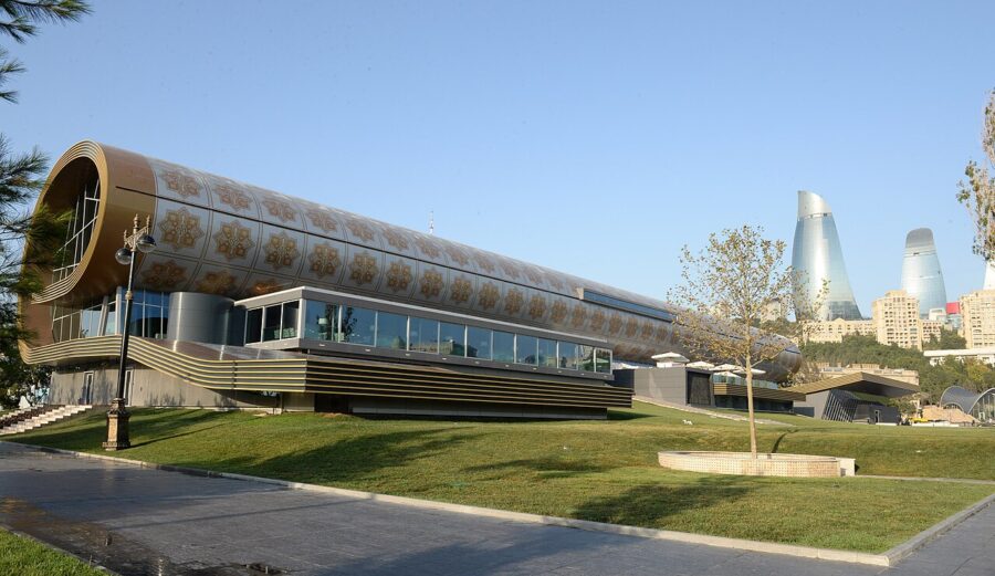 The Azerbaijan Carpet Museum in Baku, showcasing a unique architectural design with a prominent tube atop the building