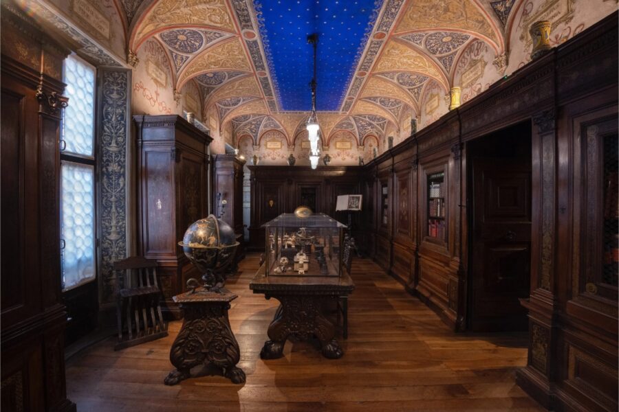 Interior view of the Bagatti Valsecchi Museum in Milan, showcasing ornate decor and historical art pieces