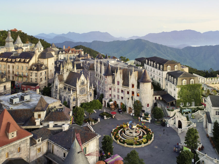 Mercure Danang French Village Bana Hills resort overlooking misty Vietnam mountains and European-style architecture.