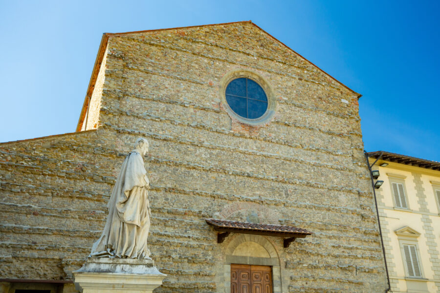 Basilica di San Francesco in Arezzo, featuring the monument of Vittorio Fossombroni in the foreground