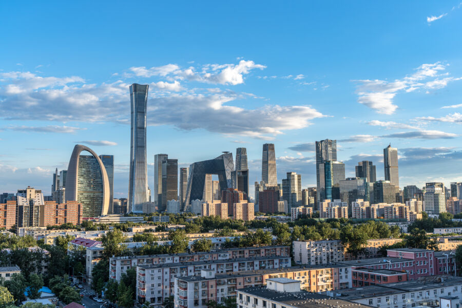 The Beijing International Trade Complex stands tall, representing a hub of international commerce in a vibrant metropolis