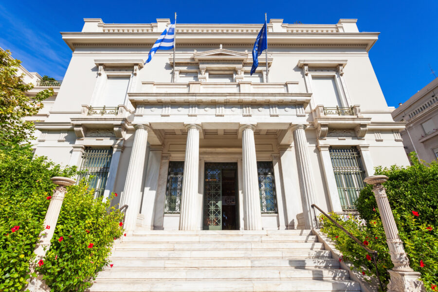 Exterior view of the Benaki Museum in Athens, Greece, showcasing its architectural design and surrounding landscape
