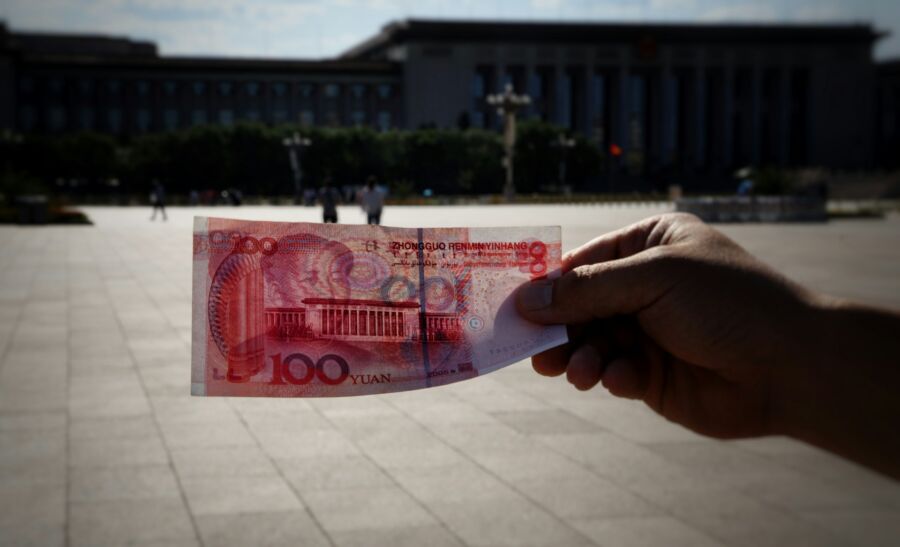 Tourist holding Chinese yuan 