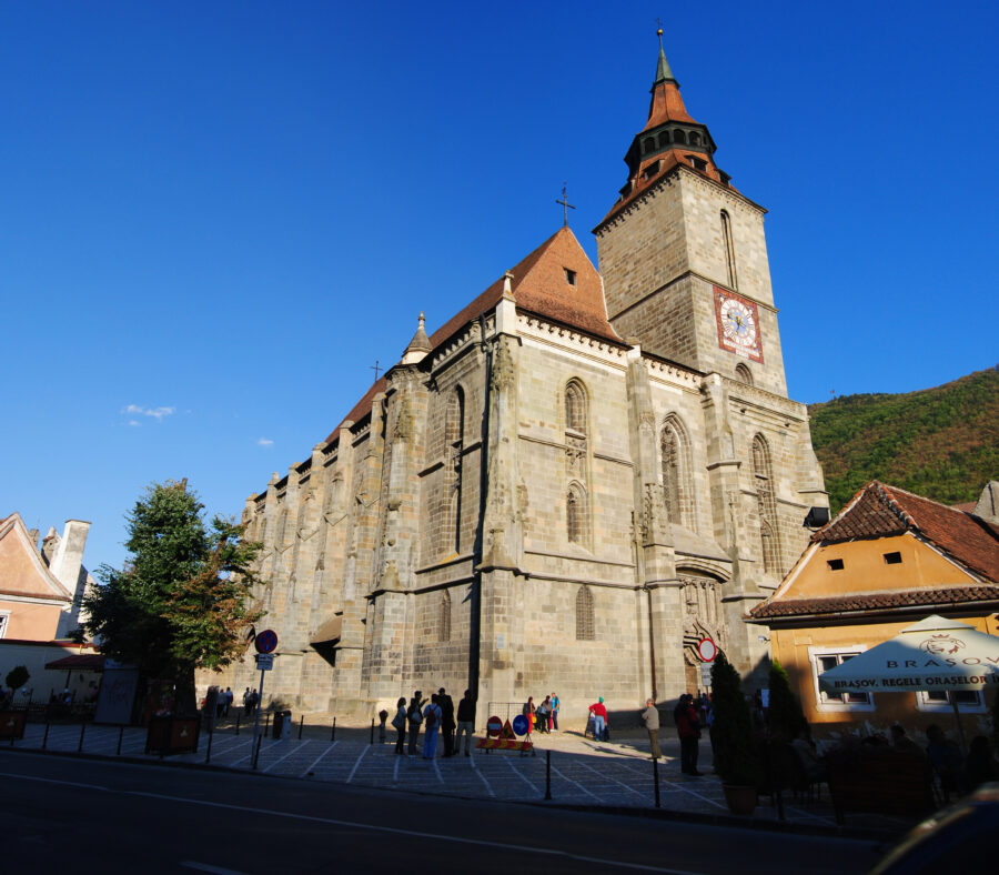 Close-up of the Black Church in Brașov, showcasing its Gothic architecture and intricate stone details.