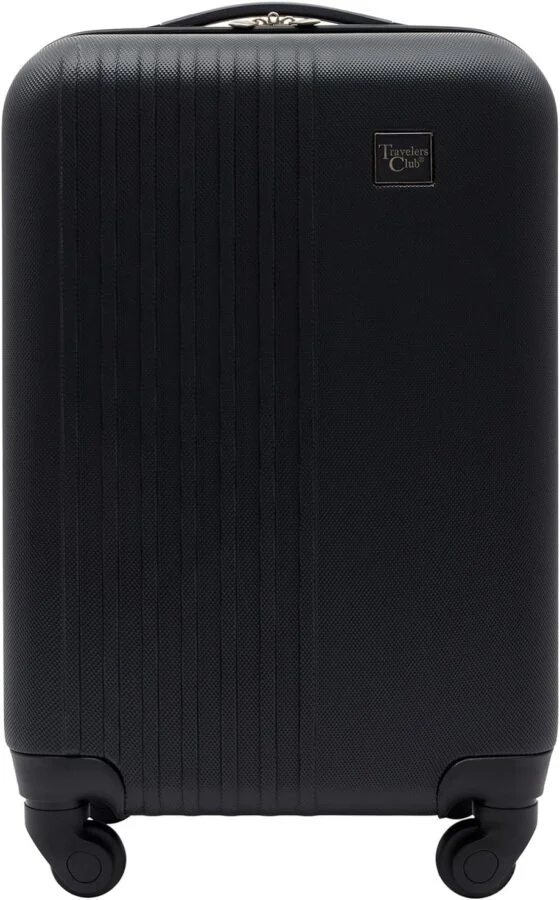 Travelers Club black hardshell carry-on spinner suitcase.