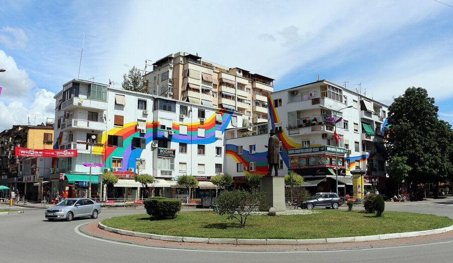 Colorful building featuring a rainbow mural in the Blloku District, Tirana, Albania.