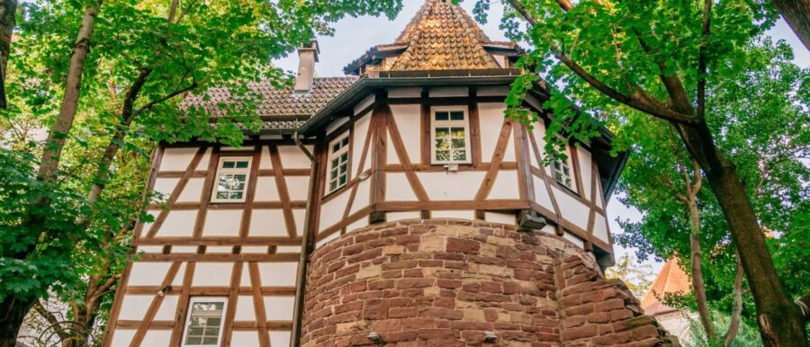 Charming house with a tower nestled in a lush forest in Bohnenviertel, Stuttgart, Germany.