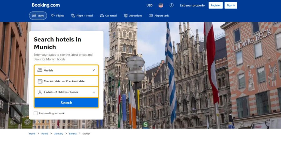 Booking.com webpage displaying a search interface for hotels in Munich, featuring filters and available dates.
