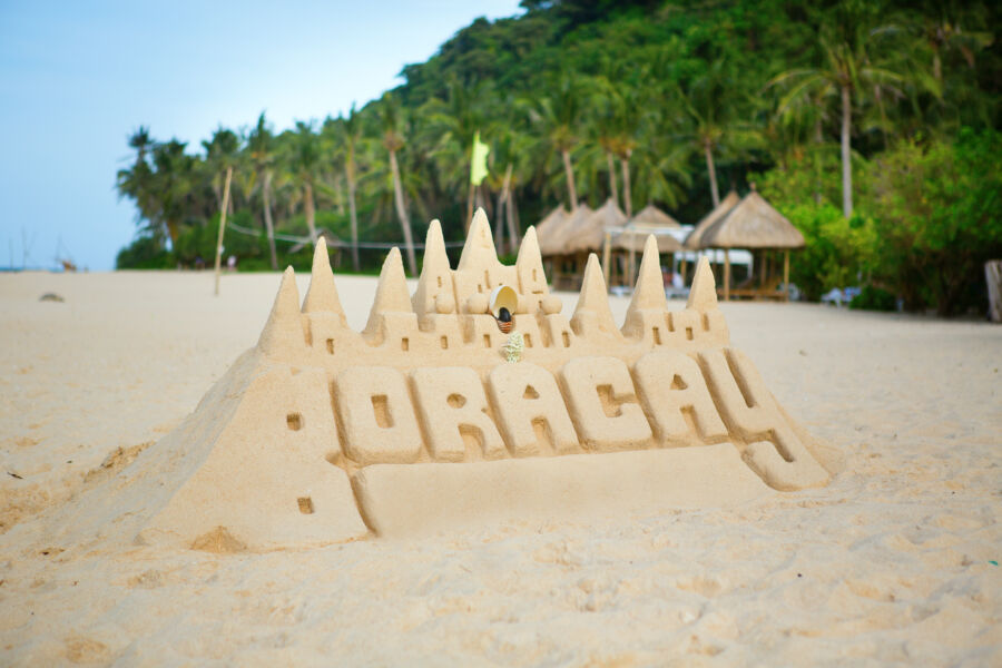 Sand castle on Boracay beach, showcasing intricate designs