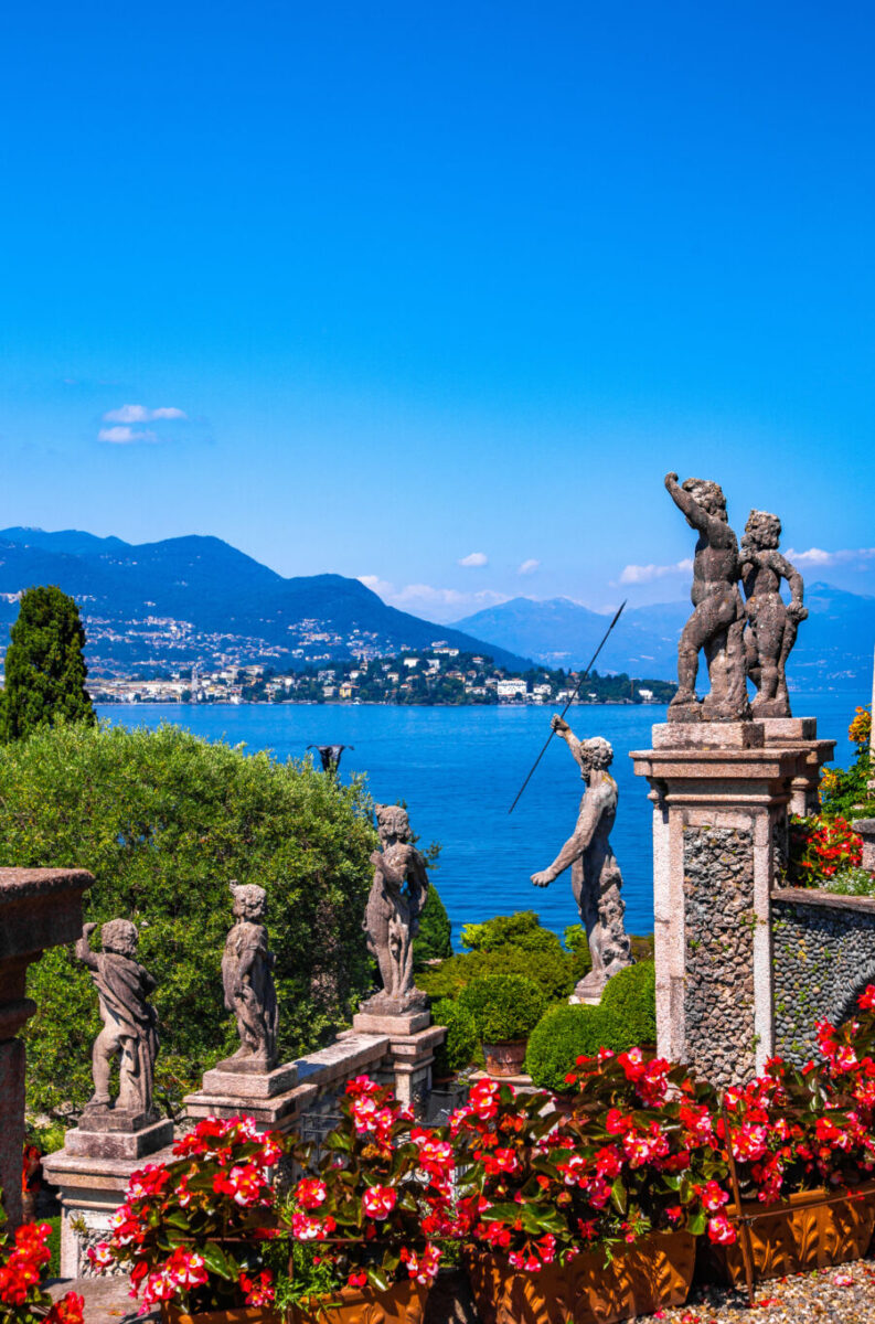 Aerial perspective of Isola Bella, highlighting its lush gardens and historic buildings in Lake Maggiore, Italy.