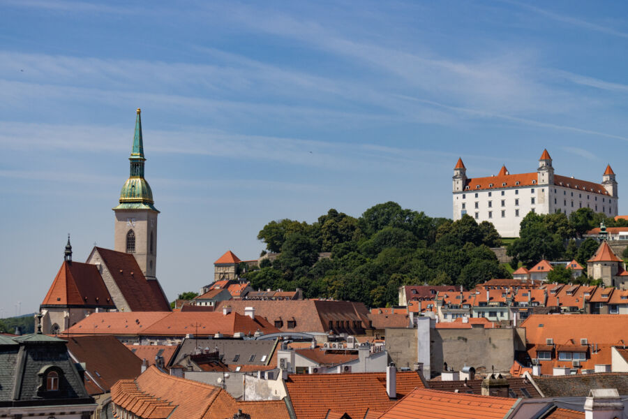 Bratislava Old Town skyline featuring historic buildings and a clear blue sky on a sunny summer day