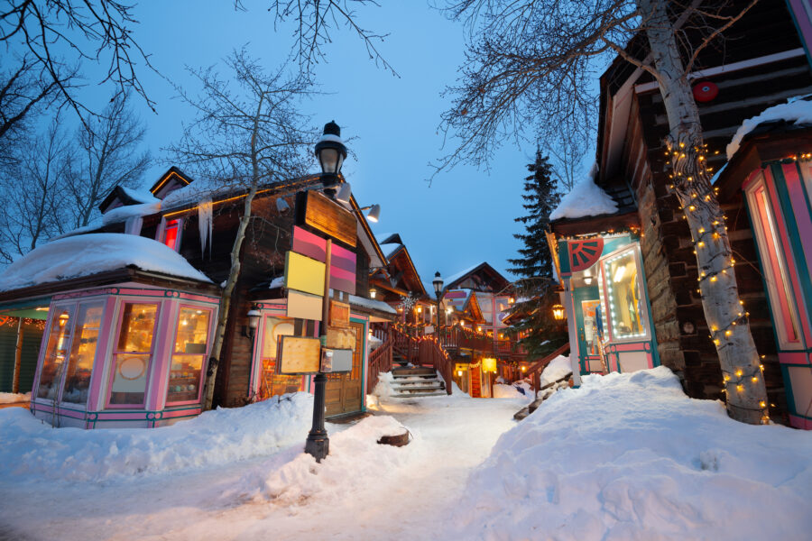 Downtown Breckenridge, Colorado, adorned with vibrant Christmas lights, captures the magic of winter nights