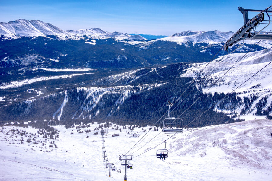 Breckenridge, Colorado ski resort town with spring scenery, featuring ski slopes and vibrant mountain landscapes