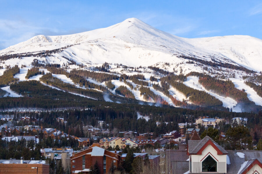 Winter scene of Breckenridge, Colorado, showcasing Peak 8 ski runs and the charming ski town in Summit County