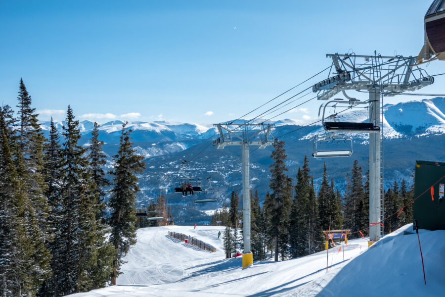 Scenic views of Breckenridge, Colorado, showcasing snow-capped mountains and charming ski resort town architecture
