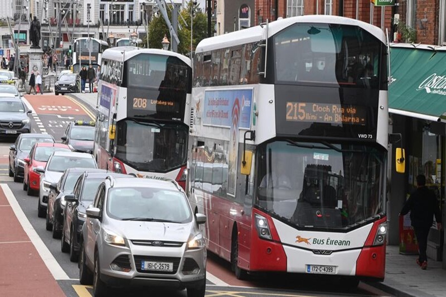 Bridge Street Cork traffic with Bus Eireann double-decker buses blocked by illegal parking causing congestion.