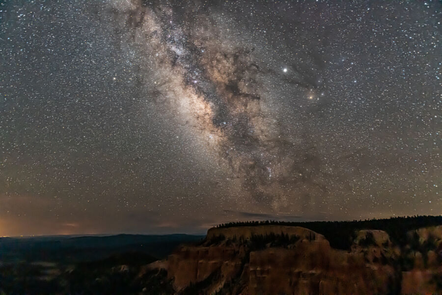 Starry night sky over Bryce Canyon, showcasing the dark Milky Way from the Pariah View Overlook in Utah