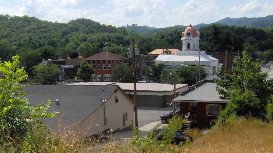 Scenic view of Bryson City, North Carolina, featuring a church and several houses nestled in the town.