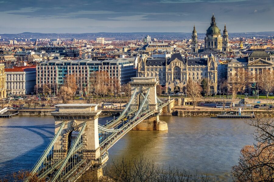 Stunning view of Chain Bridge spanning river with Budapests architectural skyline.