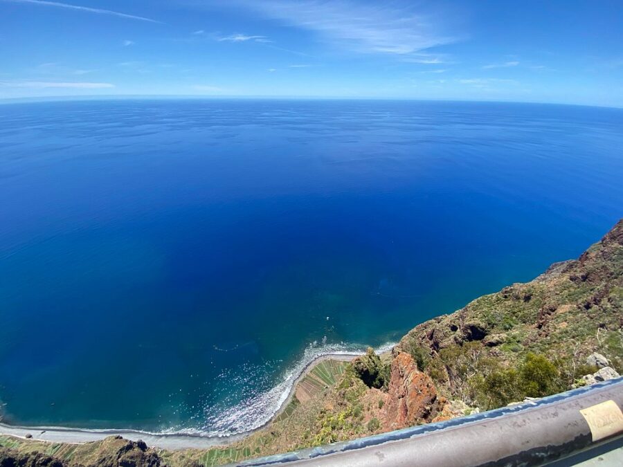 Scenic vista from Cabo Girão, Madeira Island, featuring the ocean stretching out below from the peak of the mountain.
