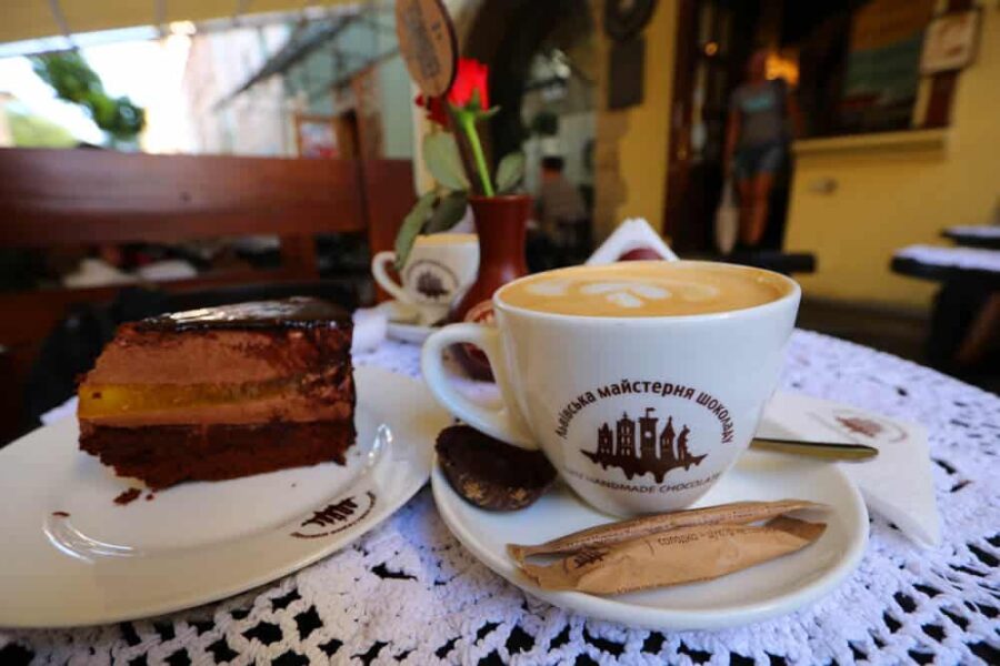 Coffee and cake in a cozy café setting with vintage charm.