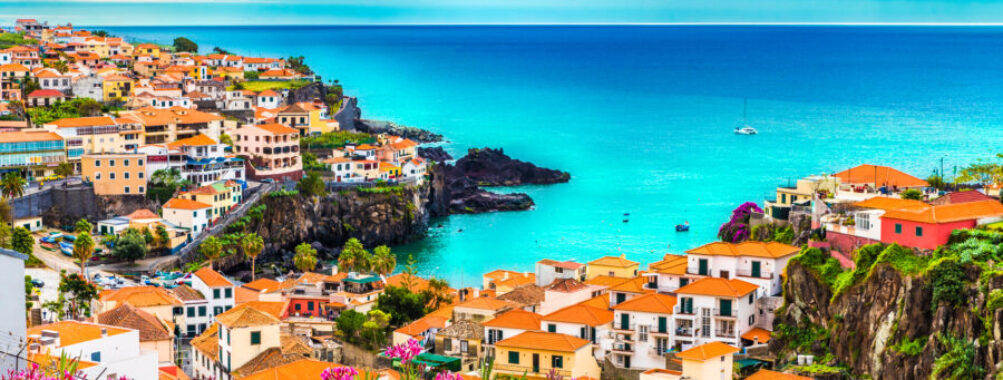 Scenic panorama of Camara de Lobos, highlighting the vibrant village and beautiful ocean views on Madeira island.