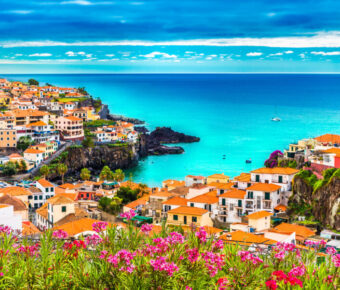 Scenic panorama of Camara de Lobos, highlighting the vibrant village and beautiful ocean views on Madeira island.
