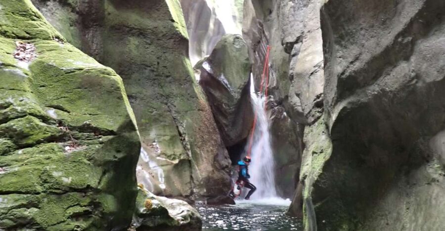 Canyoning enthusiast rappels in France