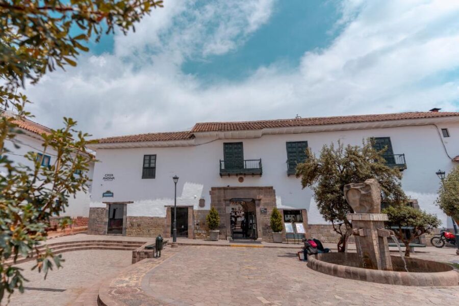 Scenic view of Cusco's old town square, highlighting traditional architecture and cultural vibrancy near Casa Andina Premium Cusco.